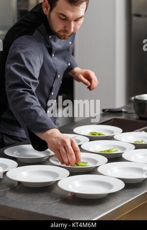 Chef making a lunch dish Stock Photo
