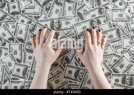 Female hands and money Stock Photo