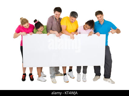 Group Of People Holding Banner Stock Photo