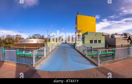 GRONINGEN, NETHERLANDS, MARCH 17, 2017: Groningen Museum footbridge wide angle panorama on sunny spring day in high resolution Stock Photo