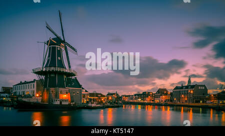 Historic Windmill in the old city centre of Haarlem, Netherlands. In retro look Stock Photo