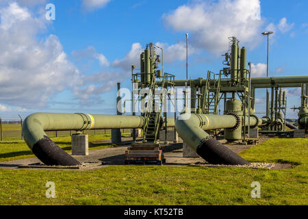 Old working wells on Natural gas field processing site Stock Photo