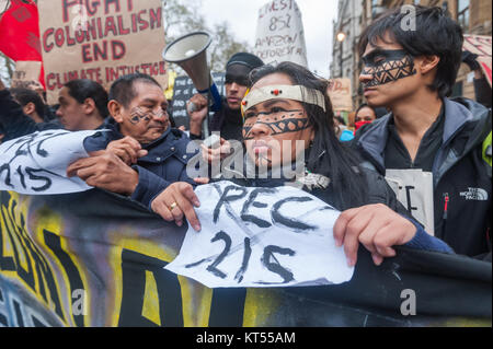 Peole carrying the Global Frontlines banner at the front of the Climate March  hold posters against PEC215, the Brazilian constitutional amendment which will take away the rights to their ancestral lands, Stock Photo