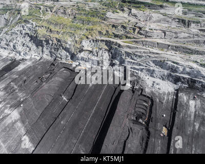 Surface coal mining in Poland. Destroyed land. View from above. Surrealistic landscape. Stock Photo