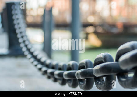 Large Iron Chain Links with focus on very front Stock Photo