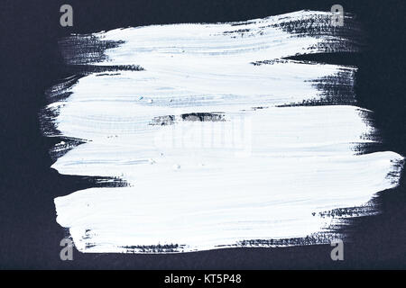abstract painting with white brush strokes on black Stock Photo