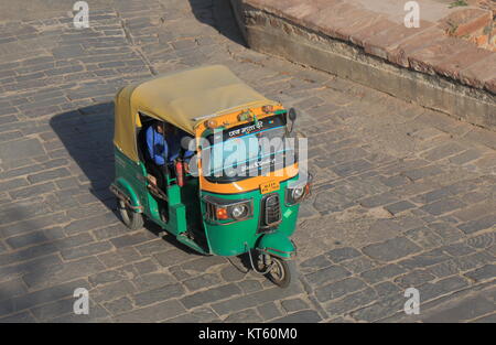 Tuk Tuk driver takes passengers in Jodhpur India. Stock Photo