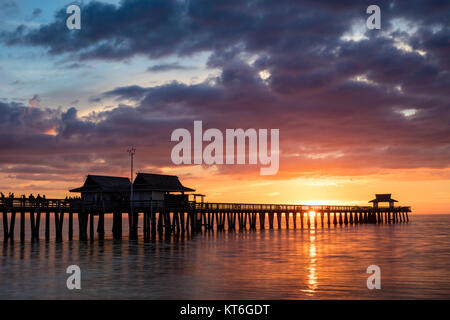 Colorful sunset over the Naples Pier, Naples, Florida, USA Stock Photo