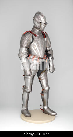 This armor set, known as 'Armor for Field and Tilt,' is an example of medieval European armor used in jousting and battle. It is part of the collection at the Metropolitan Museum of Art, showcasing craftsmanship and historical military practices. Stock Photo