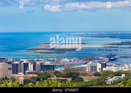 Elevated view of the Daniel K. Inouye International Airport, Oahu, Hawaii with the Pacific Ocean behind Stock Photo