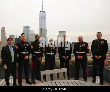 Lt. Gen. Rex McMillian (center right), commander of Marine Forces Reserve and Marine Forces North, poses for a group Stock Photo