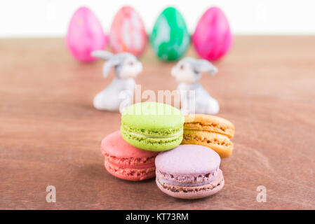 Macarons with Easter egg and bunnies Stock Photo