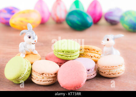 Macarons with Easter egg and bunnies Stock Photo