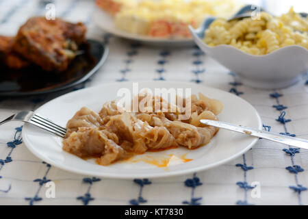 Serbian specialty sarma in the white plate chopped Stock Photo