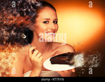 chocolate cake - glamorous woman eats dessert Stock Photo