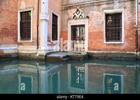 Venice church, mystic canal reflections, Ospizio Badoer Stock Photo