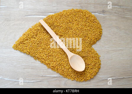 Large bulgur, large-sized bulgur, heart shaped cog corset, bulgur love, turkey bulgur, turkish bulgur.Natural and organic bulgur Stock Photo