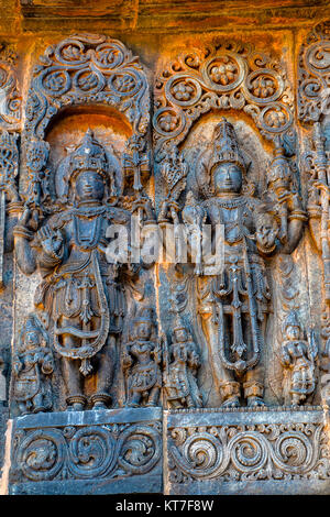 Maheshwara, Vishnu deity sculptures. Hoysalesvara Temple, Halebid, Karnataka, 12th Century. Shiva temple Stock Photo