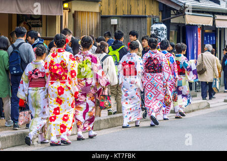 KYOTO,JAPAN - NOVEMBER 16 : Tourists wearing japanese traditional kimono walking in Arashiyama,Kyoto in Japan on November 16, 2017. Stock Photo