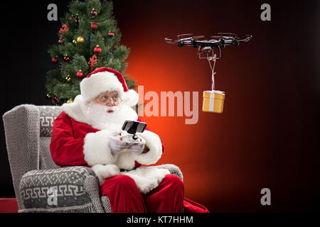 Santa Claus using drone Stock Photo