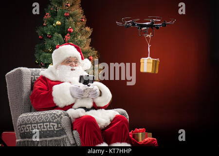 Santa Claus using drone Stock Photo