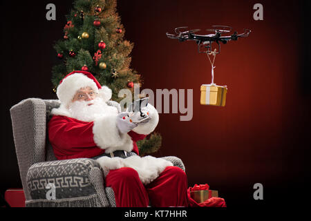 Santa Claus using drone Stock Photo