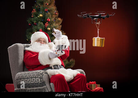 Santa Claus using drone Stock Photo