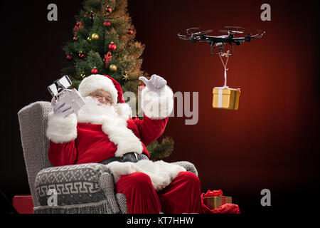 Santa Claus using drone Stock Photo