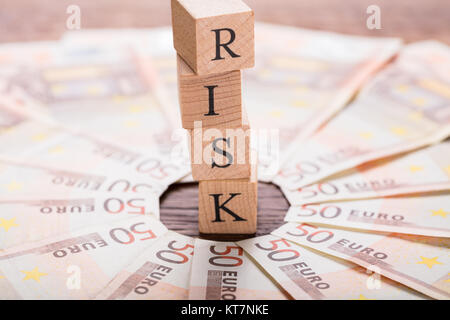 Risk Concept On Wooden Desk Stock Photo