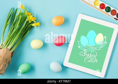 The top view of easter on blue table office workplace Stock Photo