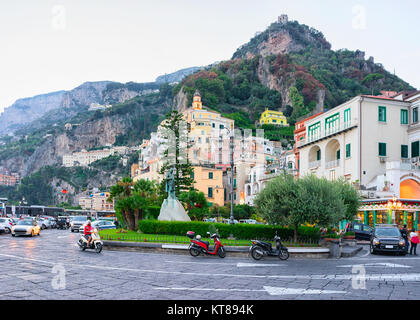 Traffic on road in Amalfi town in autumn, Amalfitana, Italy Stock Photo
