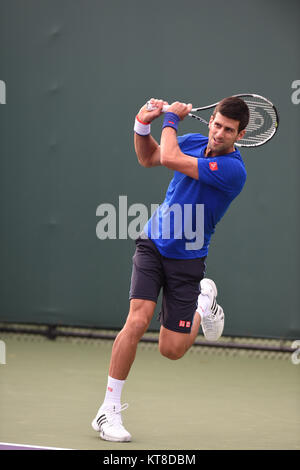 KEY BISCAYNE, FL - MARCH 28: Novak Djokovic of Serbia practices with coach Boris Becker during Day 6 of the Miami Open at Crandon Park Tennis Center on March 28, 2015 in Key Biscayne, Florida   People:  Novak Djokovic Stock Photo