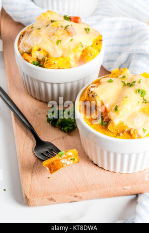 Homemade italian bread casserole strata with cheese, egg and ham, white background copy space Stock Photo