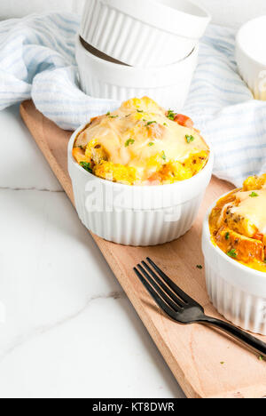 Homemade italian bread casserole strata with cheese, egg and ham, white background copy space Stock Photo