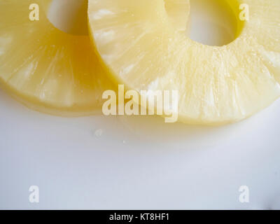 Sliced of pineapple on white background Stock Photo