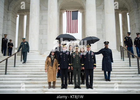 (Front Row, From Left): Karen Durham-Aguilera, executive director, Army National Military Cemeteries;  Maj. Gen. Michael Howard, commanding general, Military District of Washington; Brig. Gen. Pedro Pablo Hurtado, deputy commander, Dominican Republic Army; and Maj. Gen. Mark Stammer, commanding general, U.S. Army South; pose for a photo outside of the Memorial Amphitheater at Arlington National Cemetery, Arlington, Virginia, Nov. 9, 2017.  Earlier, Hurtado and Stammer participated in an Army Full Honors Wreath-Laying Ceremony on behalf of the Conference of the American Armies at the Tomb of th Stock Photo