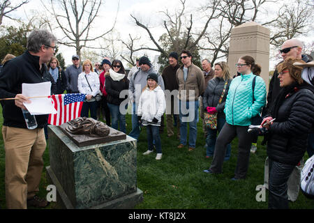 Roderick Gainer, curator at Arlington National Cemetery, talks to participants during the History Series Special Guided Tour: The Generals of the American Civil War in Section 1 of Arlington National Cemetery, April 8, 2016, in Arlington, Va. The tour was the second in a series of history tours. (U.S. Army photo by Rachel Larue/Arlington National Cemetery/released) Stock Photo