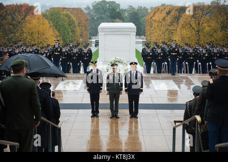 (From left) Maj. Gen. Michael Howard, commanding general, Military District of Washington; Brig. Gen. Pedro Pablo Hurtado, deputy commander, Dominican Republic Army; and Maj. Gen. Mark Stammer, commanding general, U.S. Army South; lay a wreath on behalf of the Conference of the American Armies (CAA) at the Tomb of the Unknown Soldier at Arlington National Cemetery, Arlington, Virginia, Nov. 9, 2017.  Hurtado will take over as executive secretary for CAA in 2018.  (U.S. Army photo by Elizabeth Fraser / Arlington National Cemetery / released) Stock Photo