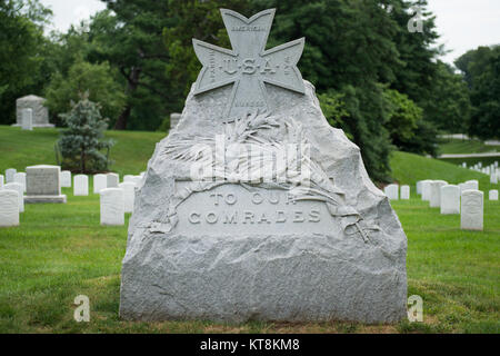 Spanish-American War Nurses Monument is located in Section 21 of Arlington National Cemetery, June 15, 2015, in Arlington, Va. The Maltese cross, the insignia of the Society of Spanish-American War Nurses, atop the large granite stone is dedicated to the memory of their 'comrades.' (U.S. Army photo by Rachel Larue/released) Stock Photo