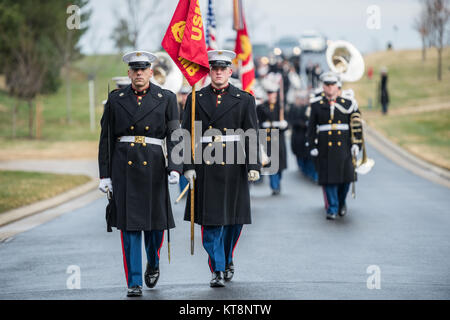 Marines from the Marine Barracks, Washington, D.C. (8th and I), The United States Marine Band, 'The President's Own”, and The 3d US Infantry Regiment (Old Guard) Caisson Platoon participate in the full honors funeral of U.S. Marine Corps. Pvt. Archie Newell in Section 60 of Arlington National Cemetery, Arlington, Va., Dec. 8, 2017.  Assigned to Company C, 2nd Tank Battalion, 2nd Marine Division in 1943, Newell died when his division attempted to secure the small island of Betio in the Tarawa Atoll from the Japanese.  Though the battle lasted several days, Newell died on the first day of battle Stock Photo