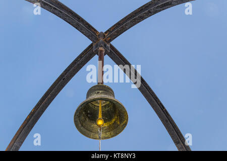 the bell on sky background old bell sky winter Stock Photo