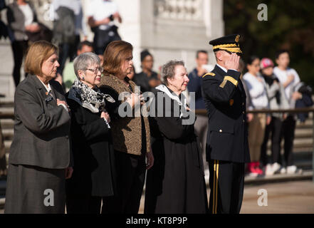 Members of the Arlington Ladies are escorted by Maj. Gen. Bradley A. Becker, commanding general Joint Force Headquarters-National Capital Region and the U.S. Army Military District of Washington, to the Tomb of the Unknown Soldier at Arlington National Cemetery, Nov. 15, 2016, in Arlington, Va. The Arlington Ladies placed a wreath at the Tomb. (U.S. Army photo by Rachel Larue/Arlington National Cemetery/released) Stock Photo