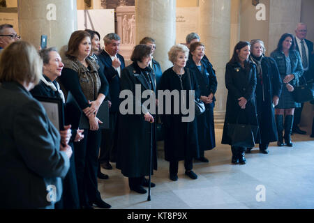 Arlington Ladies listen to Maj. Gen. Bradley A. Becker, commanding general Joint Force Headquarters-National Capital Region and the U.S. Army Military District of Washington, following a wreath laying ceremony at the Tomb of the Unknown Soldier, Nov. 11, 2016, in Arlington, Va. (U.S. Army photo by Rachel Larue/Arlington National Cemetery/released) Stock Photo