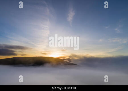 Keswick, UK. 22nd Dec, 2017. Drone aerial image of sunrise over the mist over Keswick Credit: Russell Millner/Alamy Live News