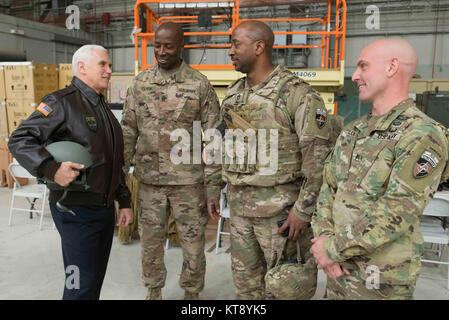 Bagram, Afghanistan. 21st Dec, 2017. U.S. Vice President Mike Pence greets service members during an unannounced Christmas visit to Bagram Air Base December 21, 2017 in Bagram, Afghanistan. Pence showed his support for the Afghan government and warned neighboring Pakistan to stop harboring militant groups. Credit: Planetpix/Alamy Live News Stock Photo