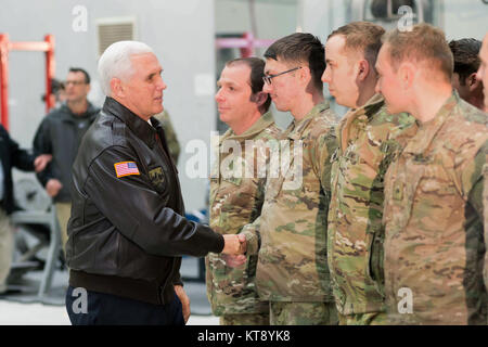 Bagram, Afghanistan. 21st Dec, 2017. U.S. Vice President Mike Pence greets service members during an unannounced Christmas visit to Bagram Air Base December 21, 2017 in Bagram, Afghanistan. Pence showed his support for the Afghan government and warned neighboring Pakistan to stop harboring militant groups. Credit: Planetpix/Alamy Live News Stock Photo