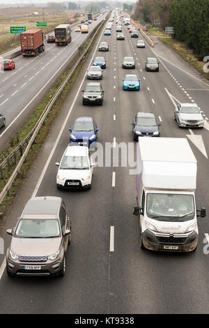 Cambridge, UK. 23rd Dec, 2017. Heavy traffic on the A14 trunk road just north of Cambridge on one of the busiest days of the year for road transport. Congestion is worse than usual as people travel to complete shopping or head off for the Christmas holiday period. Credit: Julian Eales/Alamy Live News Stock Photo