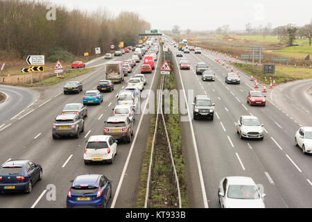 Cambridge, UK. 23rd Dec, 2017. Heavy traffic on the A14 trunk road just north of Cambridge on one of the busiest days of the year for road transport. Congestion is worse than usual as people travel to complete shopping or head off for the Christmas holiday period. Credit: Julian Eales/Alamy Live News Stock Photo