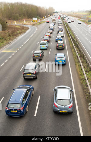 Cambridge, UK. 23rd Dec, 2017. Heavy traffic on the A14 trunk road just north of Cambridge on one of the busiest days of the year for road transport. Congestion is worse than usual as people travel to complete shopping or head off for the Christmas holiday period. Credit: Julian Eales/Alamy Live News Stock Photo