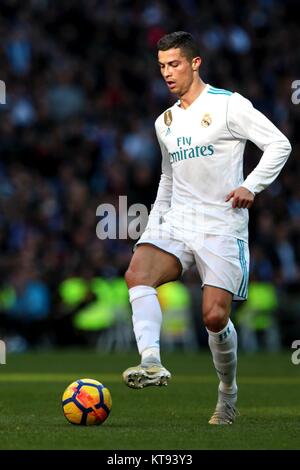 Madrid, Spain. 23rd Dec, 2017. Real Madrid's Cristiano Ronaldo controls the ball during the Spanish La Liga soccer match between Real Madrid and Barcelona at the Santiago Bernabeu stadium in Madrid, Spain, on Dec. 23, 2017. Barcelona beat Real Madrid by 3-0. Credit: Juan Carlos Rojas/Xinhua/Alamy Live News Stock Photo